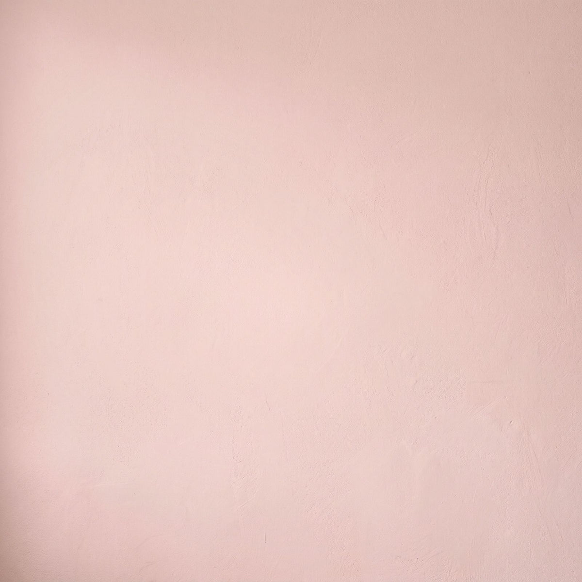 Soft pink plaster texture